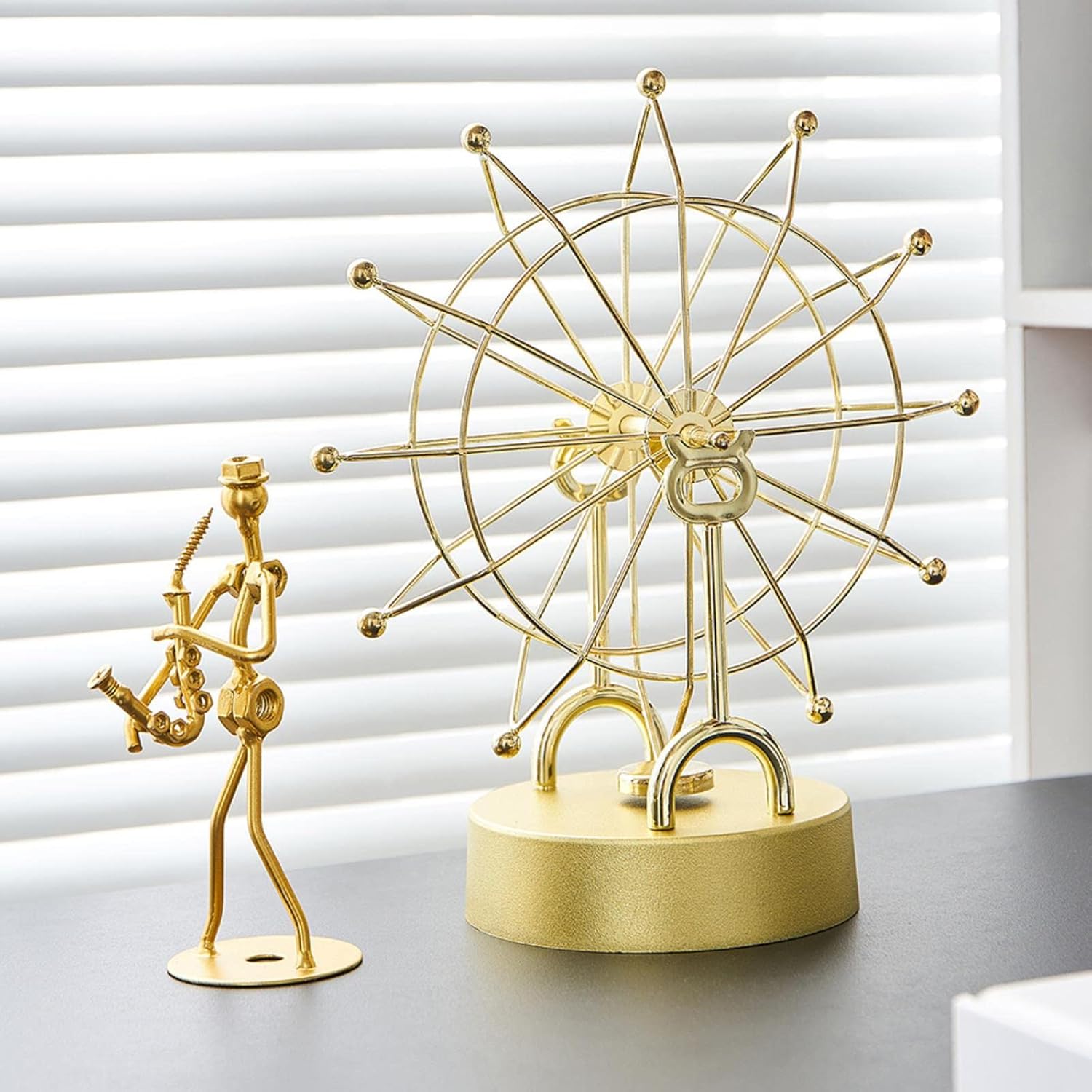 Adorno decorativo de movimiento perpetuo para mesa.